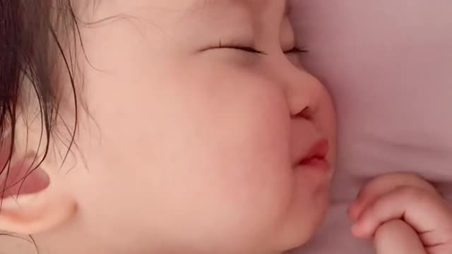 So cute baby sleeping and eating