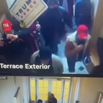 Trump supporter being let in side entrance.