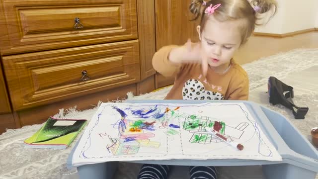 Cute Baby Shows a Master Class on Drawing