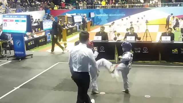 children competing in taekwondo