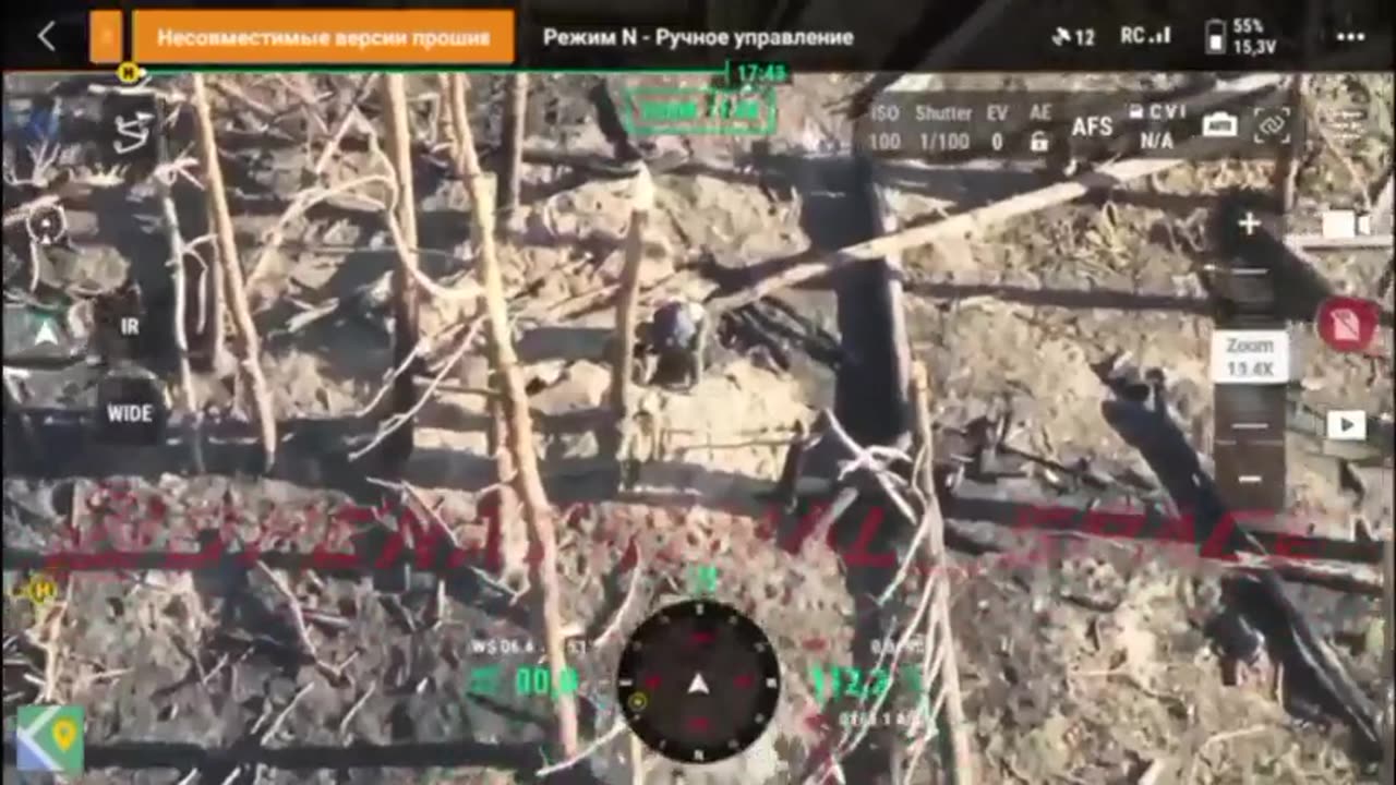 Russian soldiers helped by drone overview clear a Ukrainian dugout