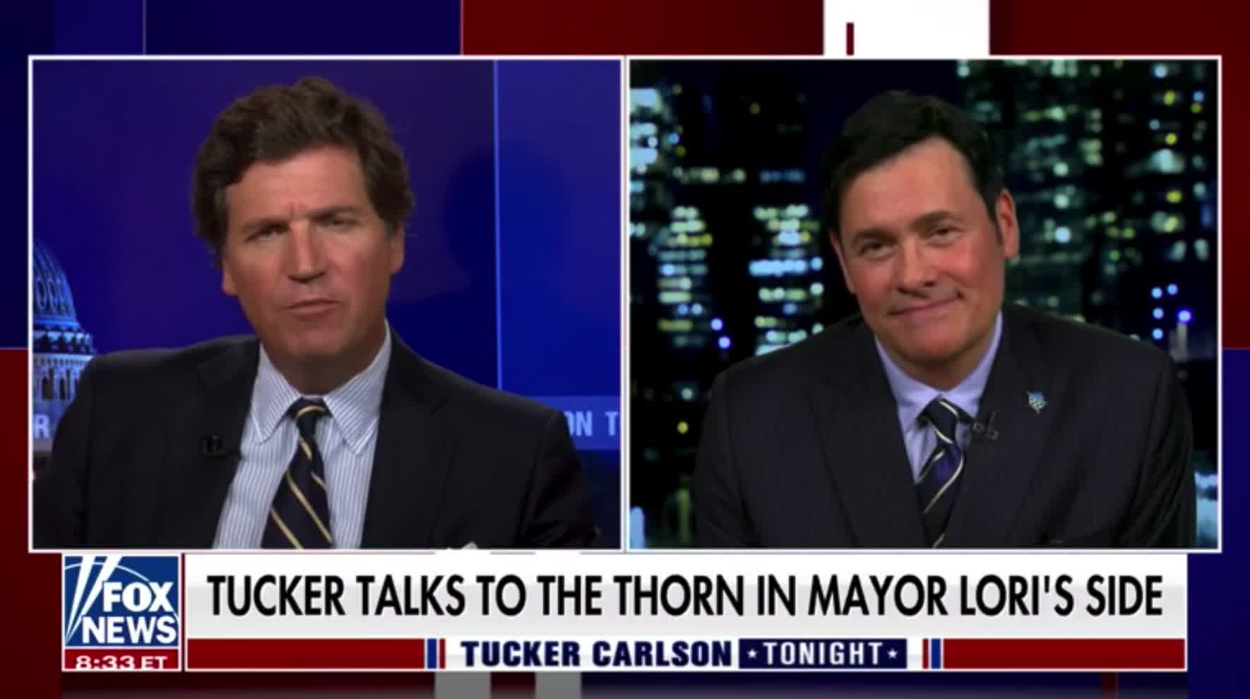 A reporter who had his press credentials revoked by Lori Lightfoot joins Tucker Carlson