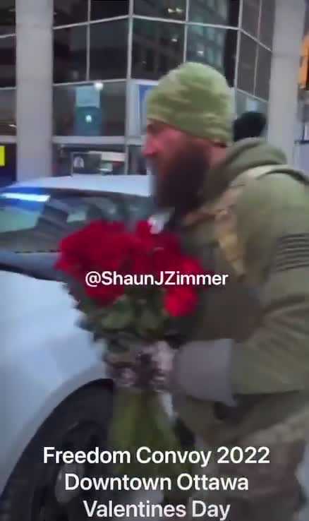 Ottawa Freedom Convoy protesters go around giving police roses for Valentine’s Day