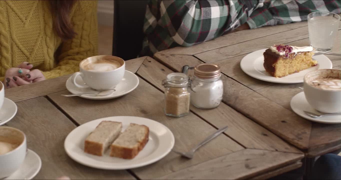 Cafe Table with Coffee and Cakes