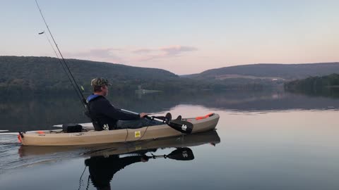 Kayaking on a glass-smooth lake