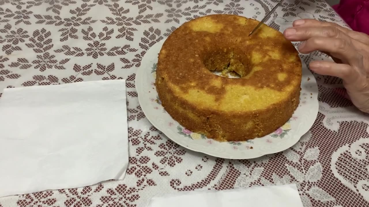 July 2022 my mom making a cake. Cornmeal with coconut.