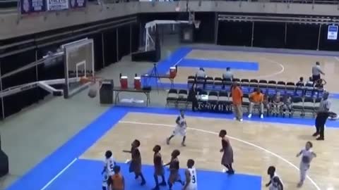 A very competitive children's basketball game