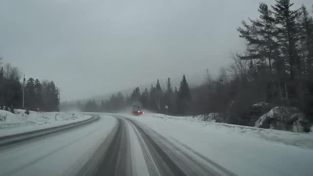 18 Wheeler Whips Around on Icy Road