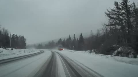 18 Wheeler Whips Around on Icy Road
