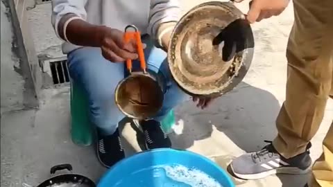 Washing pot in street