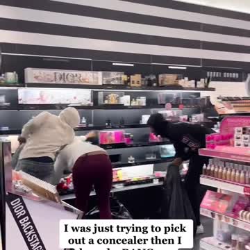 Thieves looting Sephora in front of other shoppers