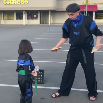 Samantha jump round house kick board break