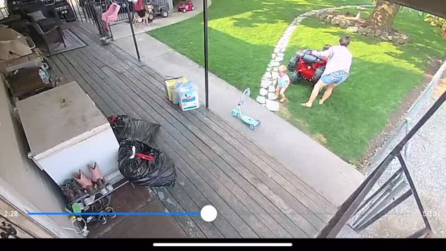 Sister Drives Toy Over Baby Brother