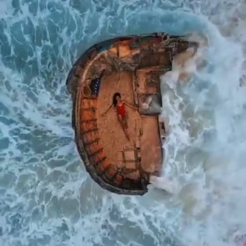 Catching waves at Nunggalan Beach in Bali