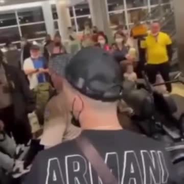 Breaking news, cop pulls gun to escape angry mob