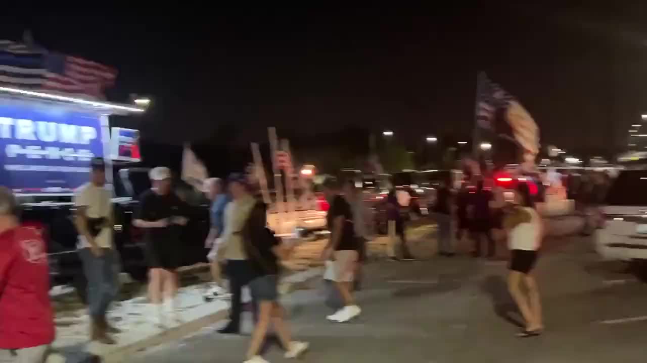 Trump Supporting Crowd near Mar-A-Lago grows by every hour .
