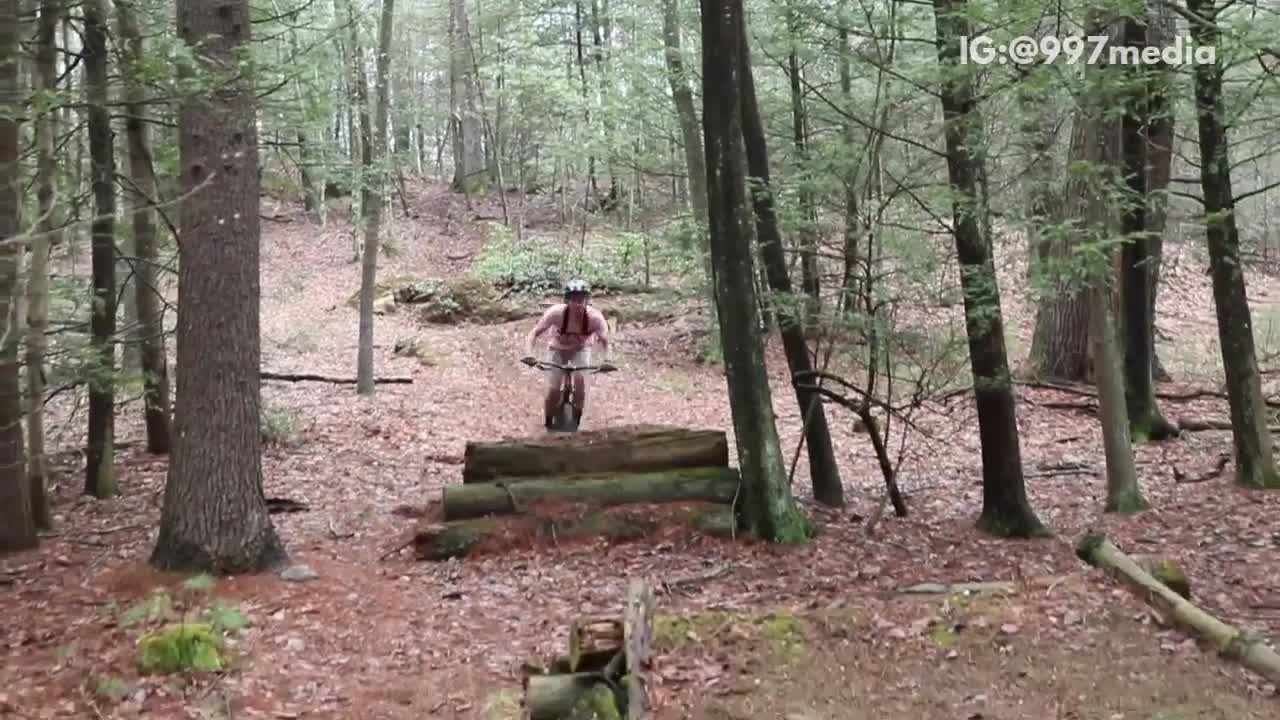 Guy in blue shirt and pink shirt bike fails