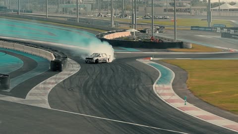 A Car Drifting At Yas Marina Circuit In Abu Dabhi