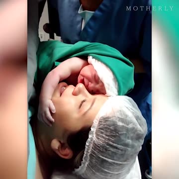 Viral video of a newborn baby clinging to her mom's face