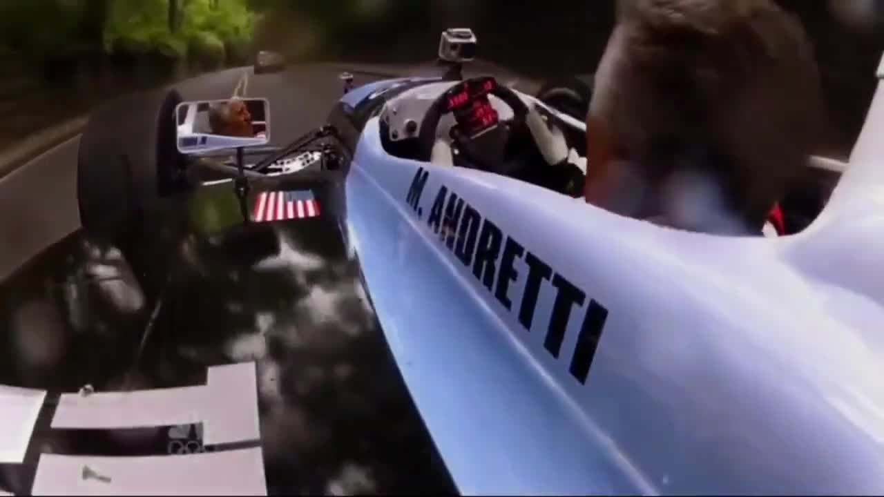 Trump rides with Mario Andretti