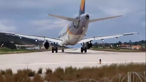 Tourist Wants To Take A Closer Look At Plane Taking