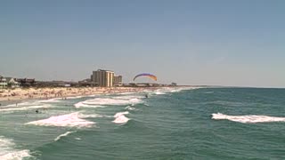 Para gliders and a Pier