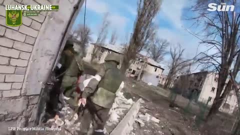 Pro-Russian soldiers dive for cover under heavy 'Ukrainian shelling' in Novotoshkivske