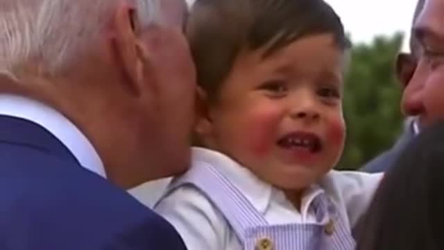 BABY is scared of Joe Biden while REACHING IN FOR A KISS