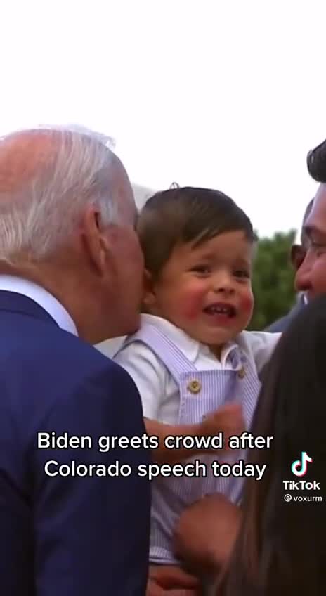 BABY is scared of Joe Biden while REACHING IN FOR A KISS