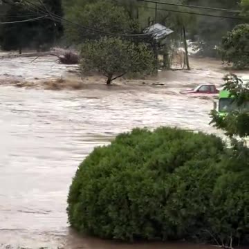 Entire home seen floating away in Asheville, North Carolina