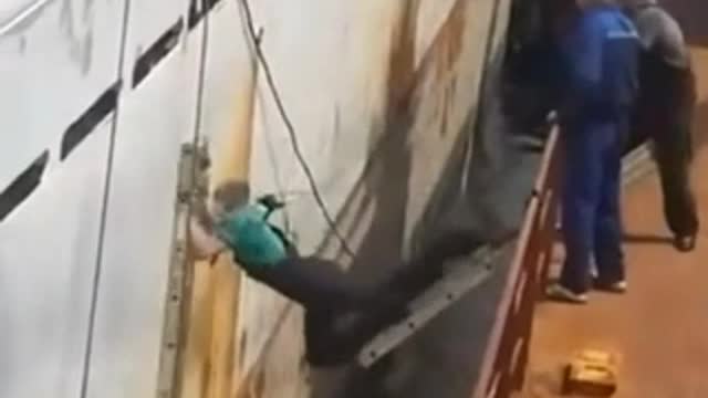 Funny boarding a boat on a rusty with old ladder (funny Video)