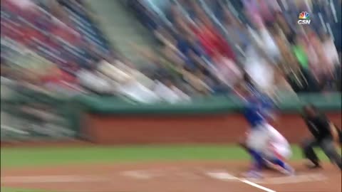 Fan grabs foul ball while holding his child