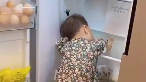 Most honest and cute baby in fridge