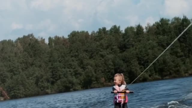 #Cute baby sleding on the water#