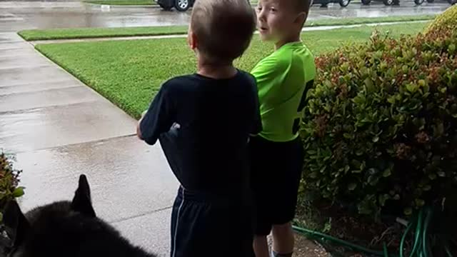 Cason, Jaxson and Dakota in the rain