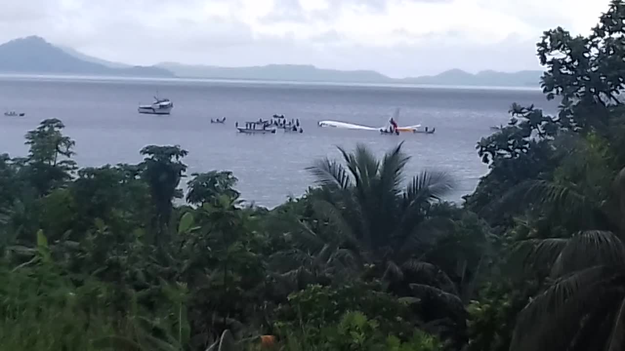 Plane Lands in Lagoon After Overshooting Runway