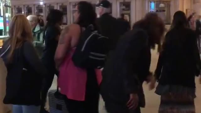 People dressed as zombies in new york station