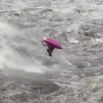 With the kayak on a swirling water