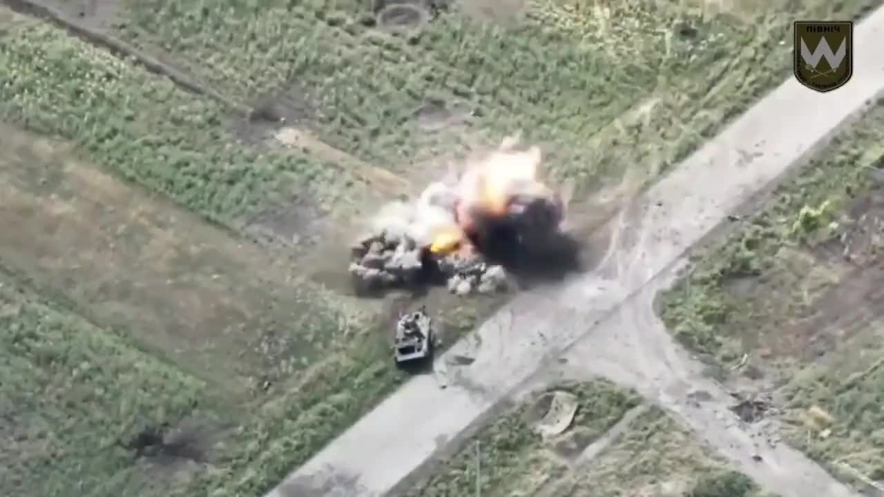 Russian BMP-2 hitting a mine while trying to navigate between two other destroyed BMP's