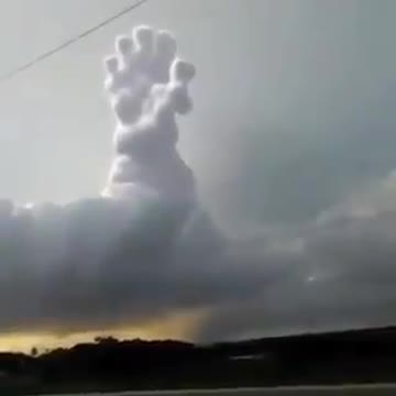 Who's Hand is this in the Clouds?