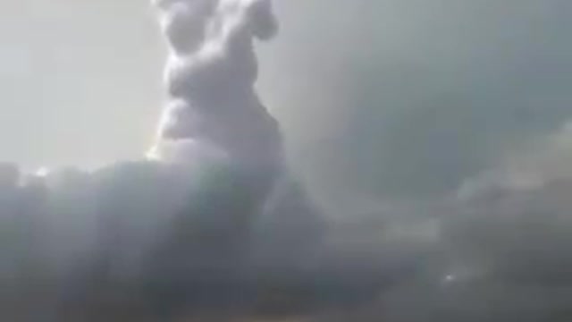 Who's Hand is this in the Clouds?