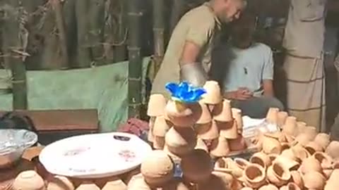 I drink tea in a clay cup