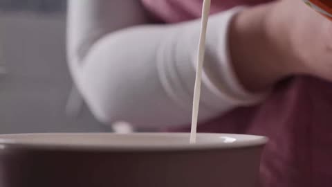 Pouring milk slowly