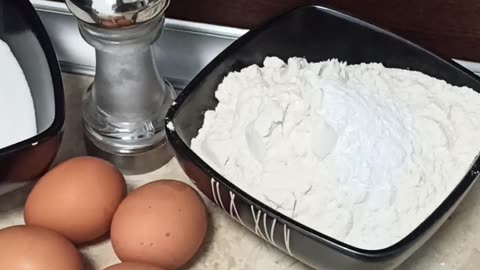 Mixing baking soda with flour