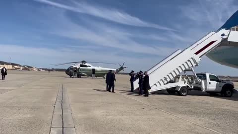 President Biden stumbles while walking up the stairs to Air Force One