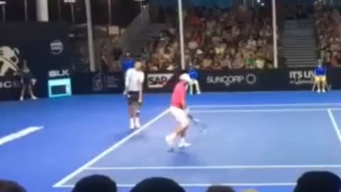 NickKyrgioswarminguphisserve#tennis