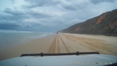 Jet Flies Over While Driving on Beach