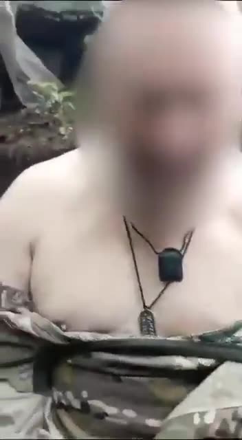 Russian Soldier Hit in the Back a Few Times