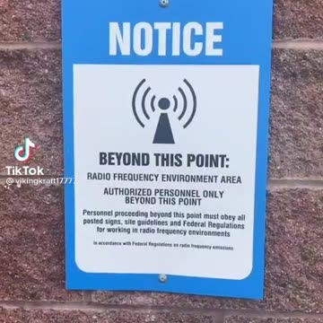 5G tower next to a school. Look at the warning signs.