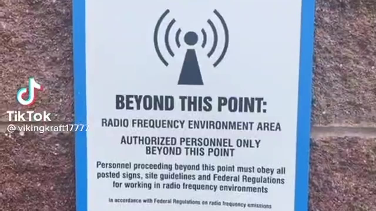 5G tower next to a school. Look at the warning signs.